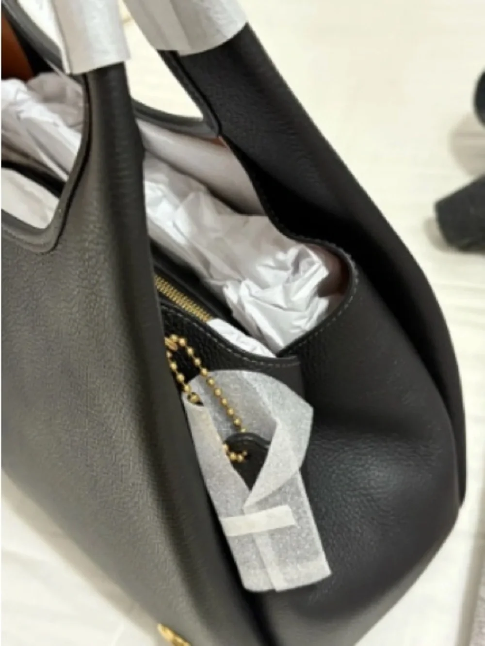 Coach Black Leather Shoulder Bag with Gold 'C' Accent